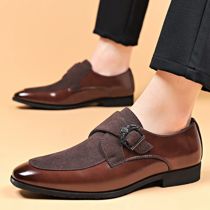View of a pair of men's brown luxury leather & suede dress shoes, showcasing their slip-on design.