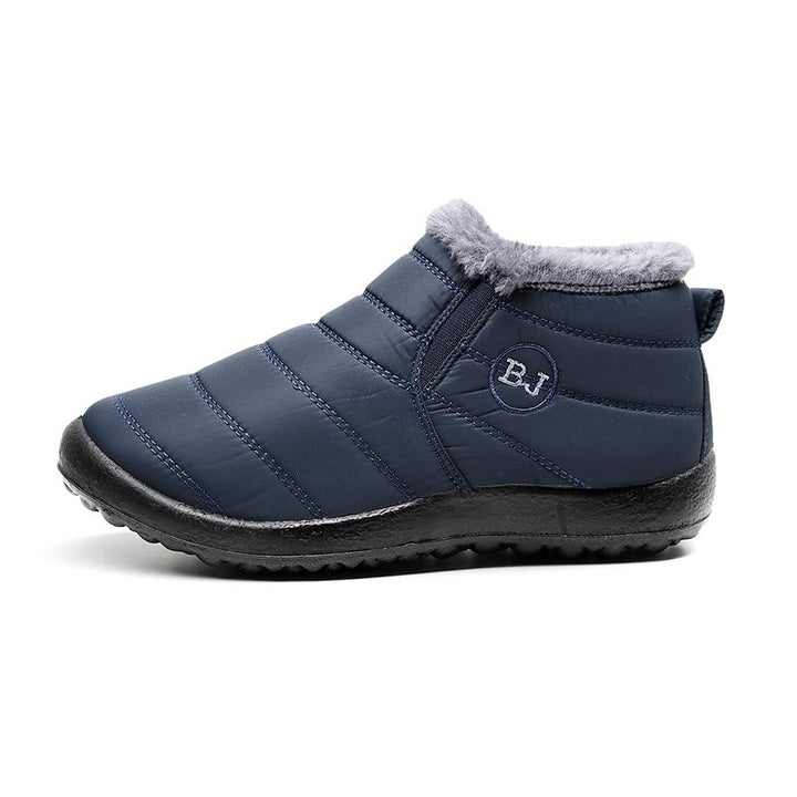 Men's stylish dark blue snow boots, waterproof and warm, perfect for casual outdoor winter wear. Insulated footwear.