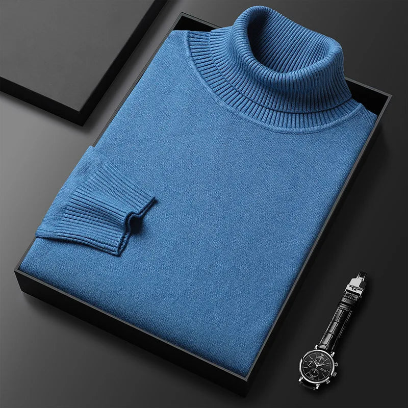 Casual yet elegant men's top: a cashmere blend turtleneck sweater in a rich navy blue, suitable for any occasion.