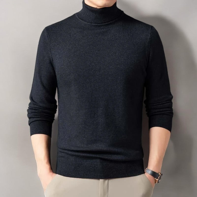 Detailed texture of a men's cashmere blend turtleneck sweater, emphasizing its softness and premium knitwear.