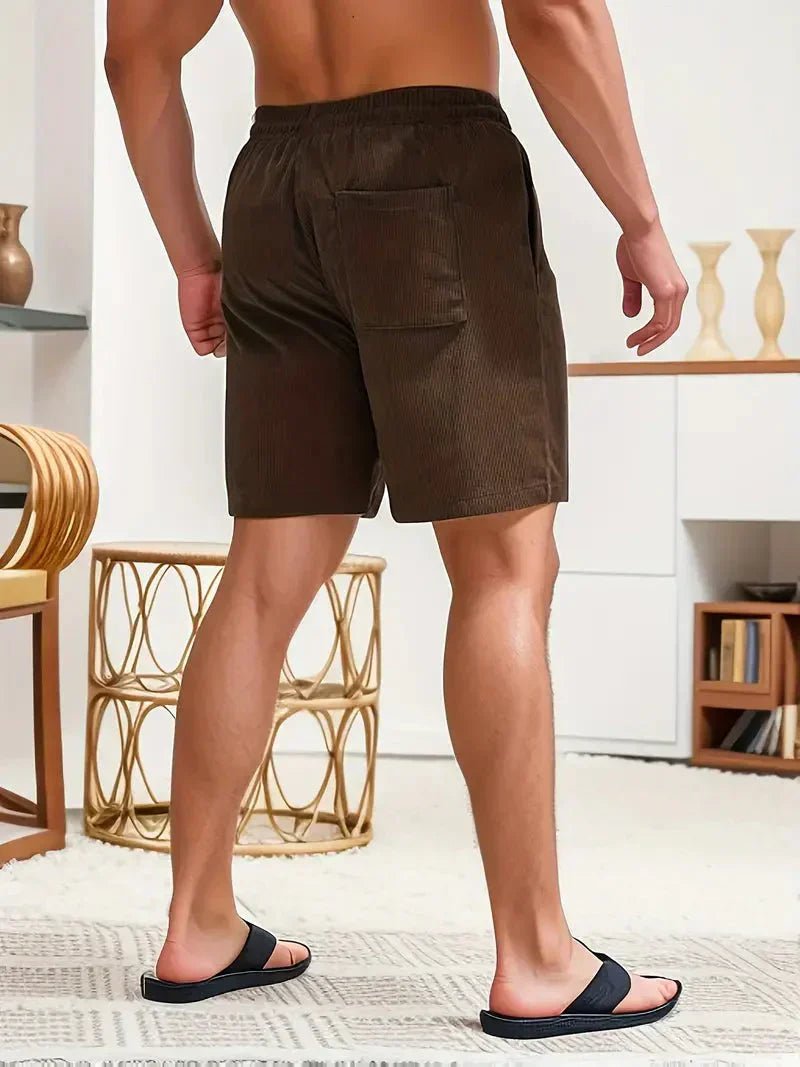 Experience comfort with men's casual corduroy shorts, featuring a functional drawstring.
