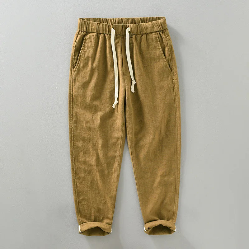 Men's casual cotton linen blend jogger pants in a light color, perfect for summer wear.