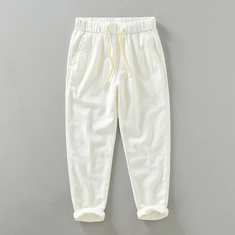 Stylish men's linen blend joggers with an elastic waistband and drawstring for comfort.