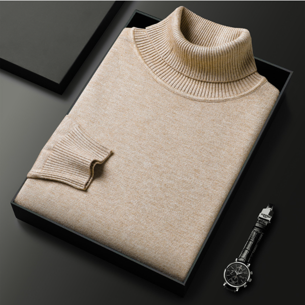 Model looking away, wearing a men's versatile long sleeve knit turtleneck sweater.