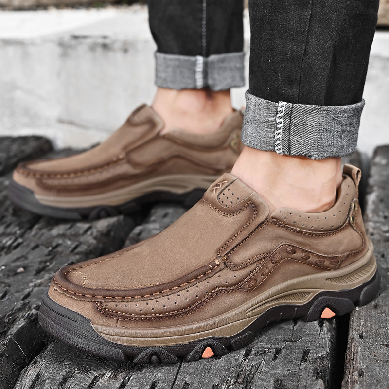 Comfortable casual black slip-on shoes for men, with orthopedic design for walking and daily use.