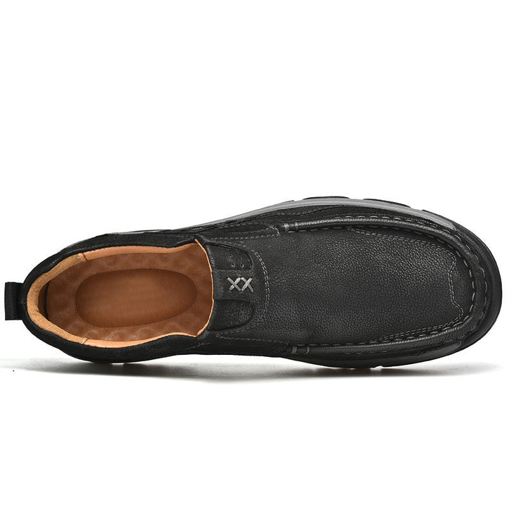 Profile view of men's brown leather slip-on shoes, showcasing casual design and orthopedic comfort.