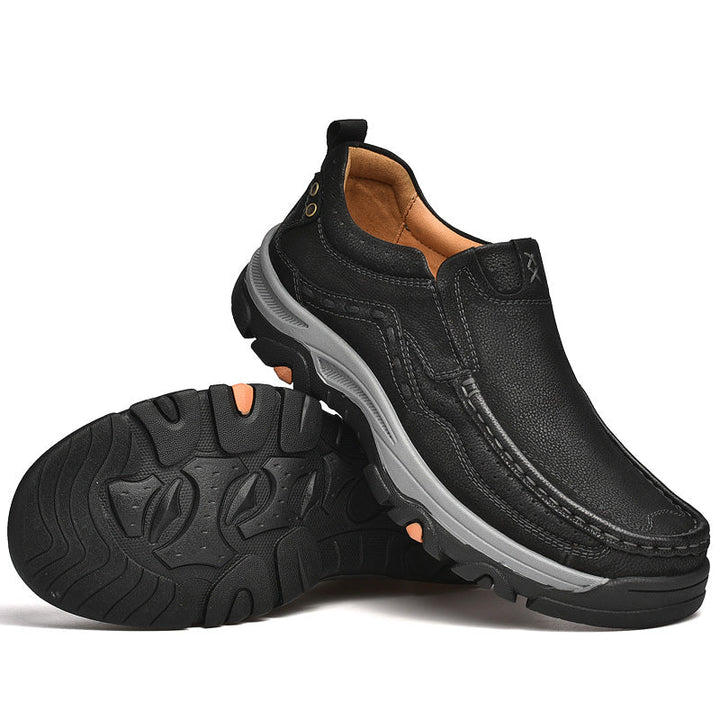 Comfortable black slip-on leather shoes for men, offering orthopedic support and casual style for walking.