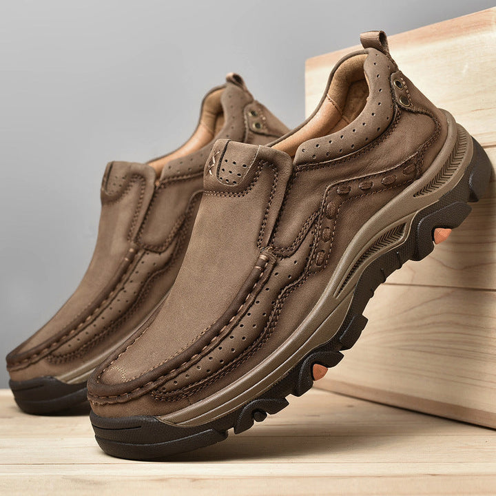 Close-up of brown leather men's slip-on shoe, highlighting orthopedic comfort and casual style.