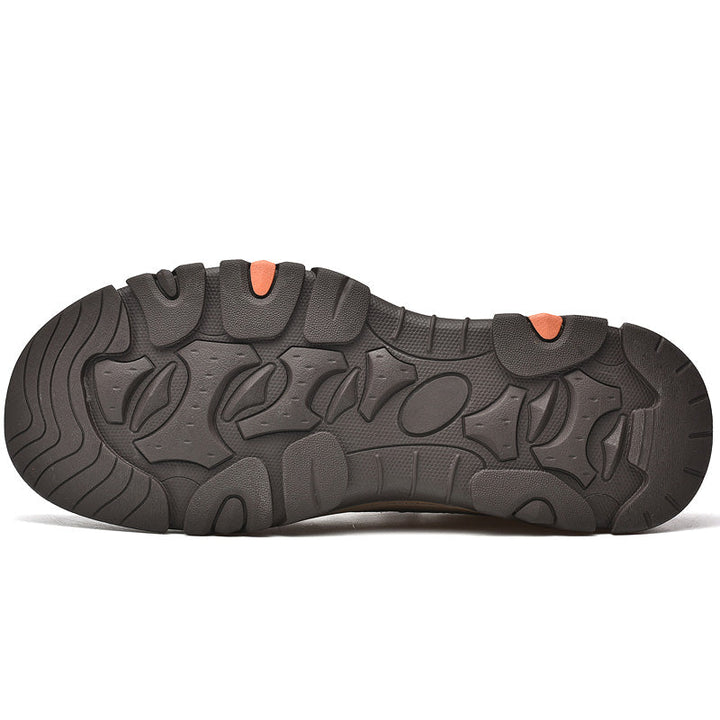 Detail view of black leather men's casual orthopedic slip-on, emphasizing material and comfortable design.