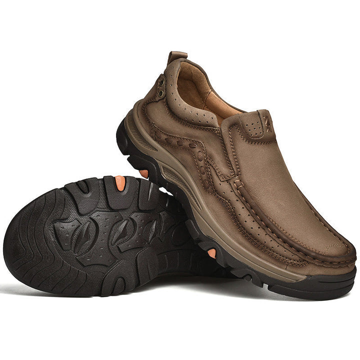 Men's walking shoes: brown leather slip-ons, designed with orthopedic comfort and casual style.
