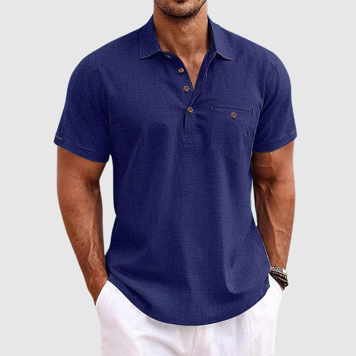 Man wearing a relaxed fit short-sleeve polo shirt. Casual summer wear for men's fashion & warm weather comfort.