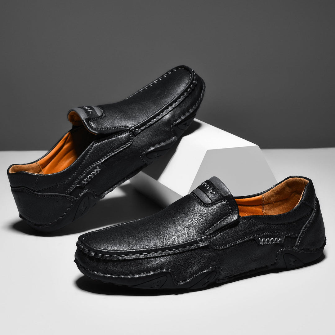Black synthetic leather men's slip-on loafers, a timeless addition to any menswear collection