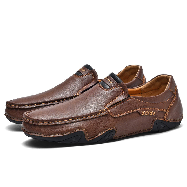 Lightweight men's slip-on loafers made from synthetic leather, ideal for casual and formal styles