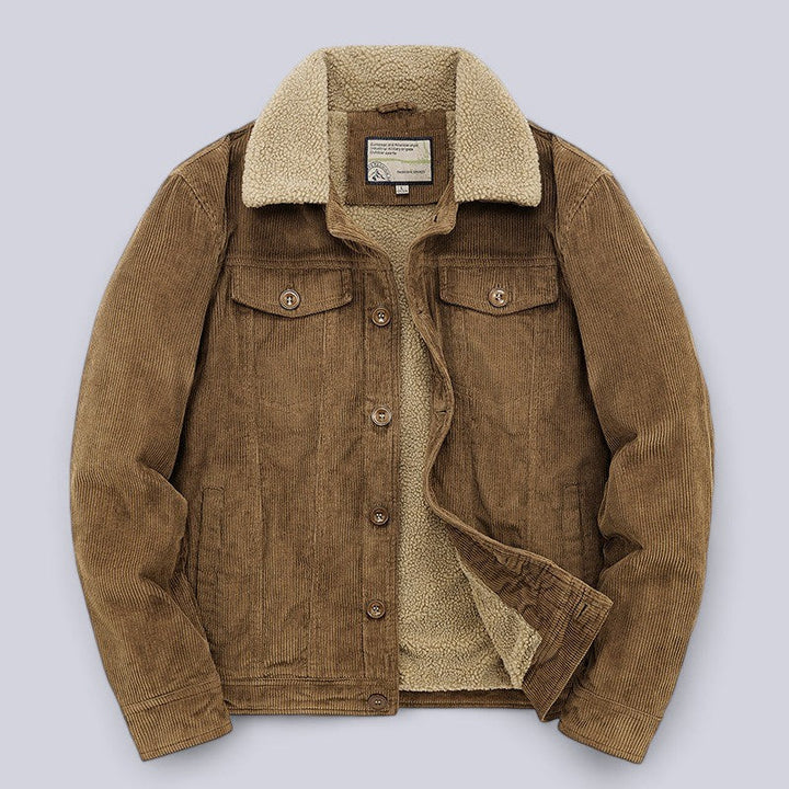Close-up of a men's classic corduroy jacket fabric, highlighting its rich texture and button details