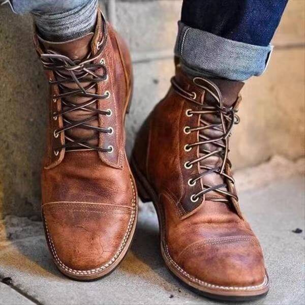 Comfortable men's brown leather boots. Durable, classic design for versatile dress & casual fashion. Essential men's footwear.