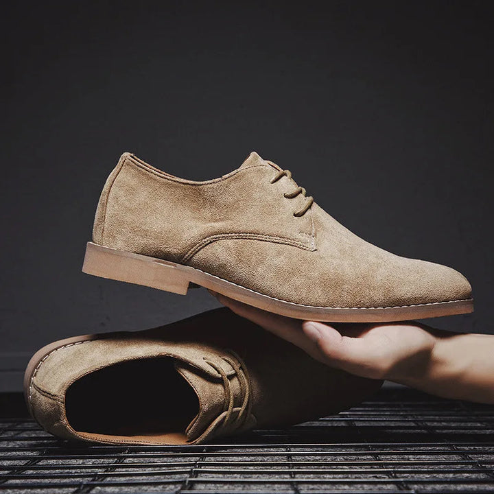 Detail of the comfortable inner lining of men's suede Oxford dress shoes, emphasizing quality.
