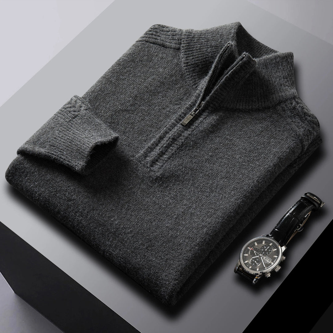 Comfortable men's quarter-zip sweater, featuring a stylish cable knit texture and casual design.