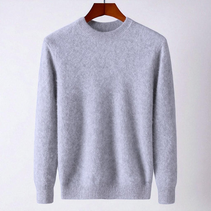 Textured image of a knit cashmere blend sweater, emphasizing the soft and luxurious feel