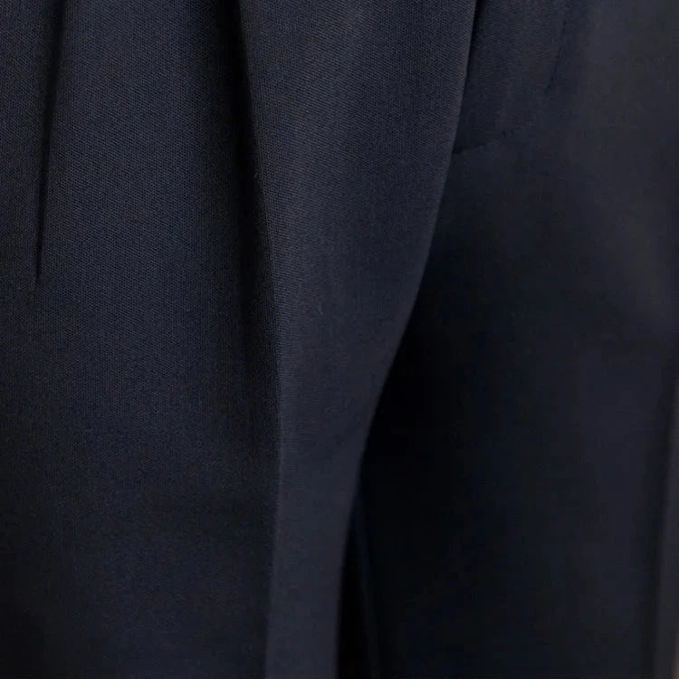 Men's straight leg dress pants in a casual office environment, showcasing business casual versatility