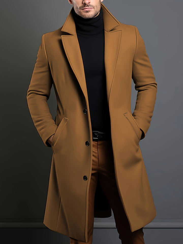 Professional men's tailored long overcoat with a single-breasted lapel. Essential for business casual winter style.