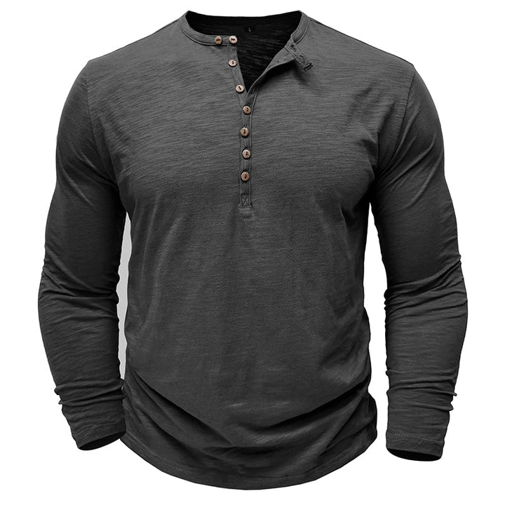 Relaxed fit men's long-sleeve henley shirt, offering ultimate comfort and versatile style for daily wear