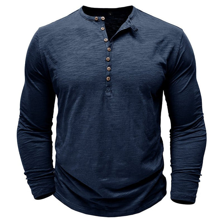 Men's soft cotton long-sleeve henley shirt in a light gray, offering comfort and timeless style