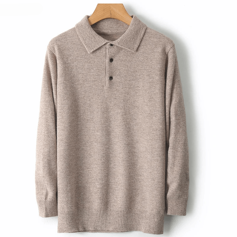 Detail of the button placket on a men's warm merino wool cardigan, highlighting quality craftsmanship.