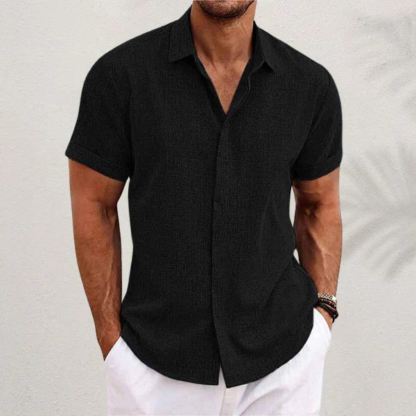 Versatile men's short-sleeve button-up shirt for casual and everyday fashion.