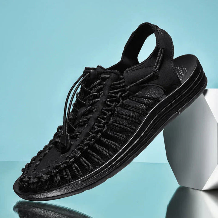 Men's closed-toe sandals with breathable mesh for outdoor summer comfort.