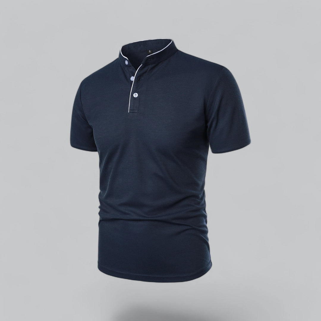 Men's collarless polo shirt, short sleeve, worn casually at an outdoor cafe. Smart casual top.