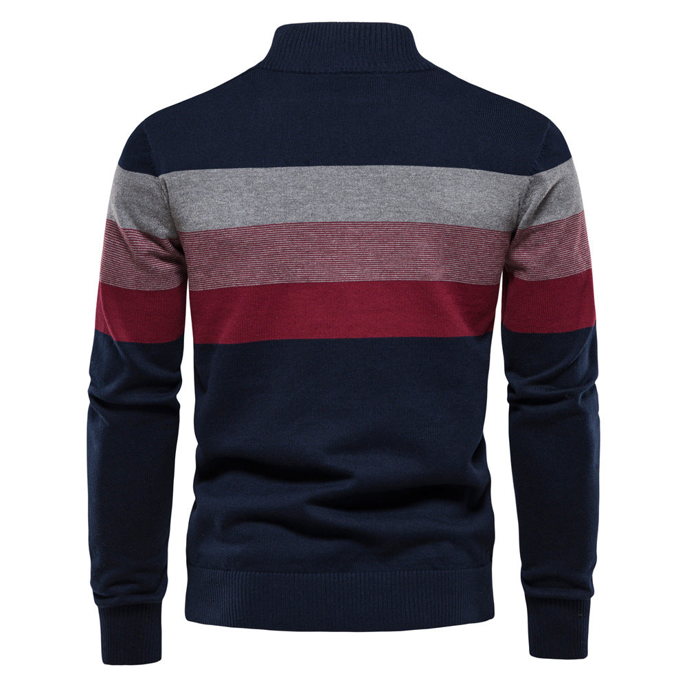 Textured shot of the knitted cotton blend of a men's colorblock half-zip sweater