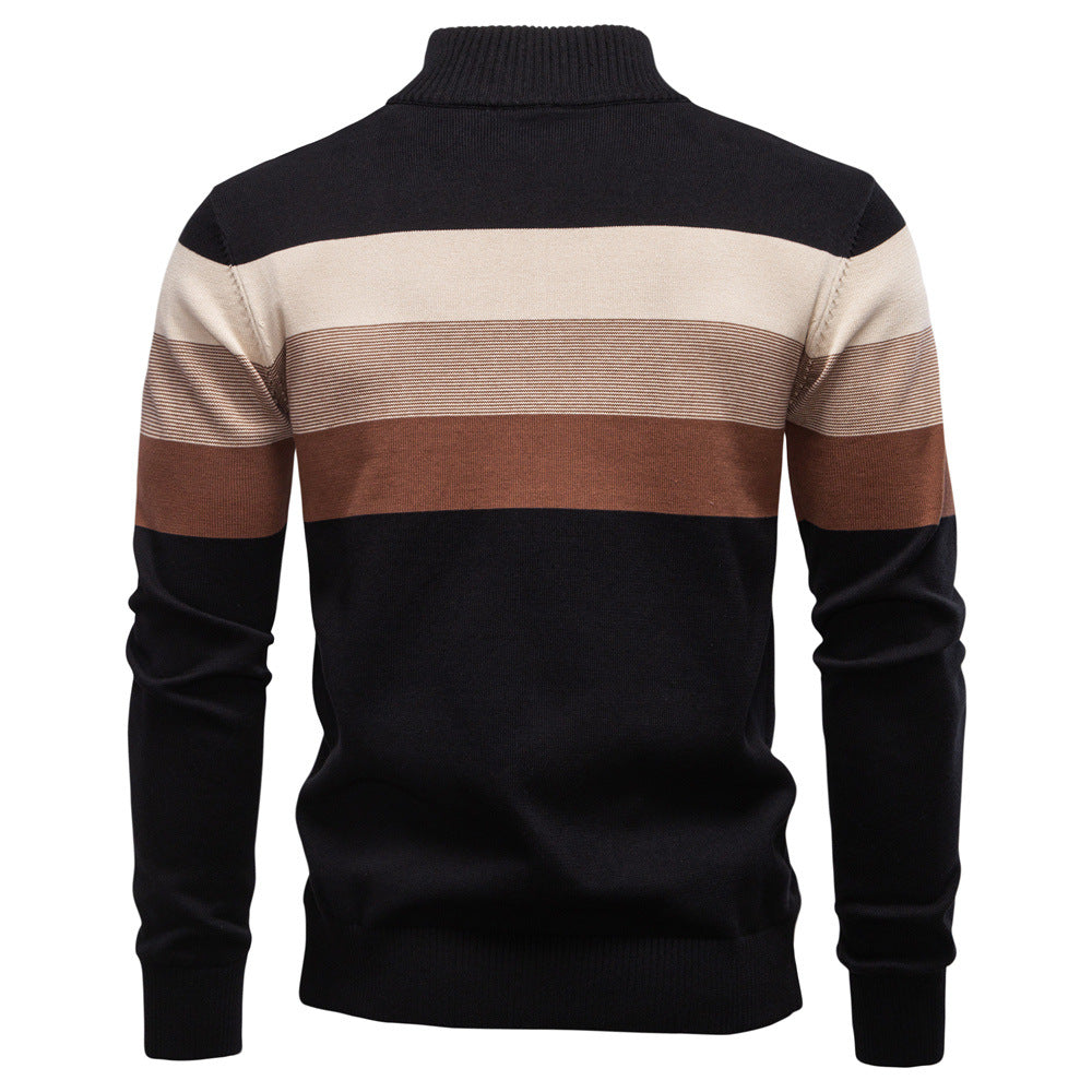 Outdoor shot of men's colorblock half-zip sweater, natural light on the fabric