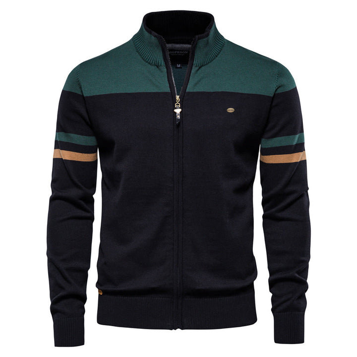 Close-up of the cuffs and hem of a men's knit colorblock zip-up cardigan, durable and soft.