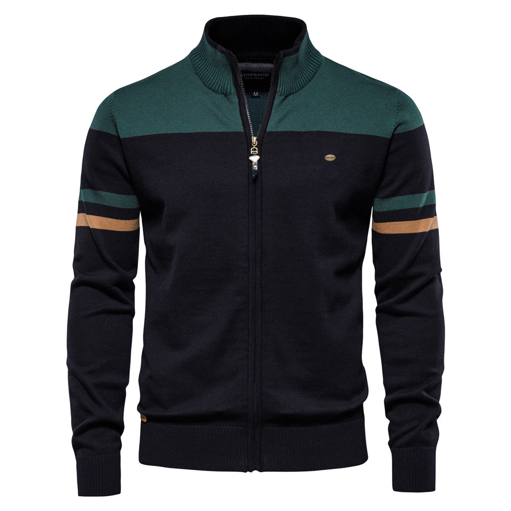 Side view of a man wearing a stylish colorblock zip-up cardigan sweater, long sleeve, lightweight.