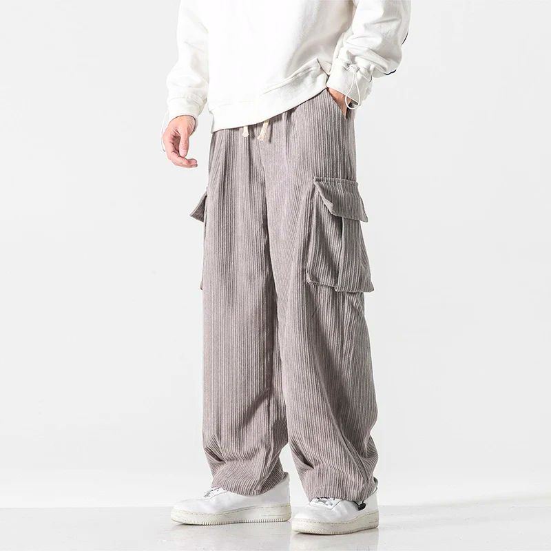 Casual men's wide-leg corduroy trousers with a relaxed fit and drawstring