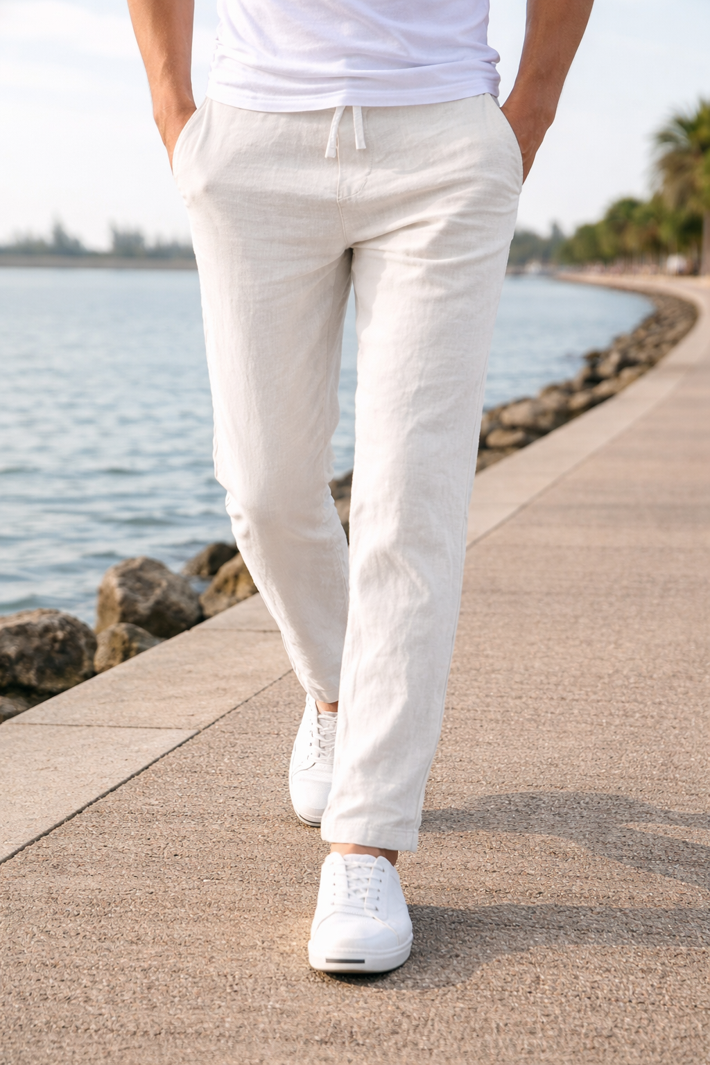 Blue men's straight leg trousers featuring a comfortable elastic drawstring waist, perfect for relaxed casual wear.