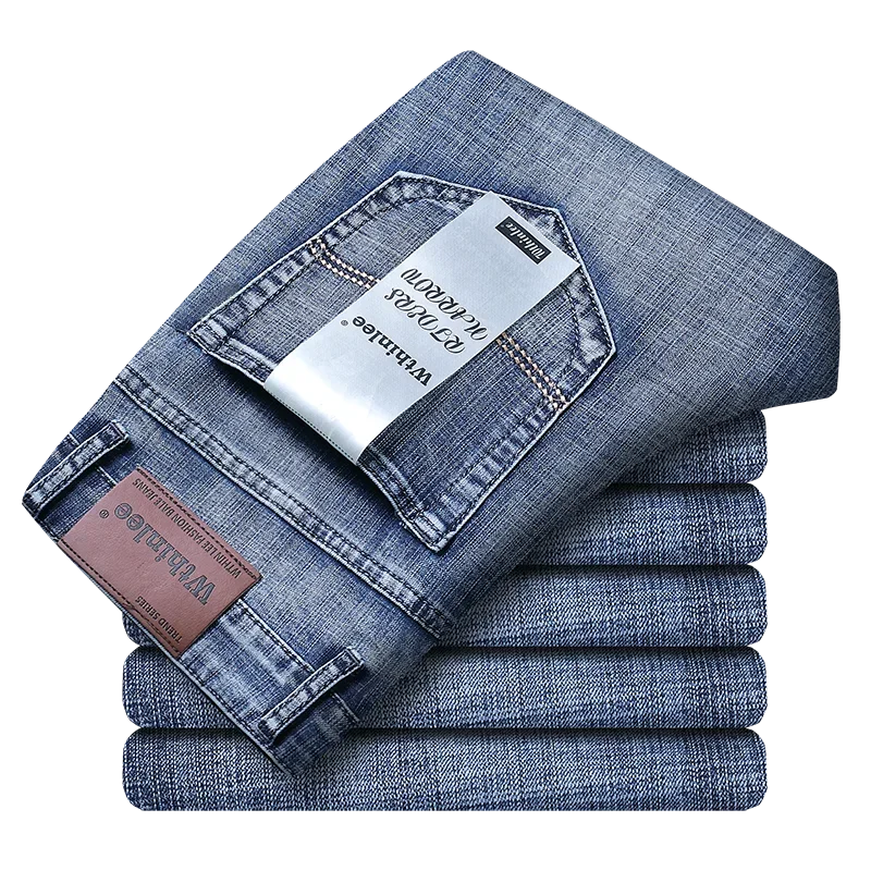 Stack of men's durable stretch denim jeans, versatile men's apparel for various occasions.