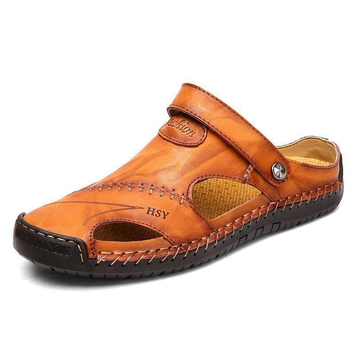 Stack of men's hand-stitched leather outdoor sandals, different color variations.