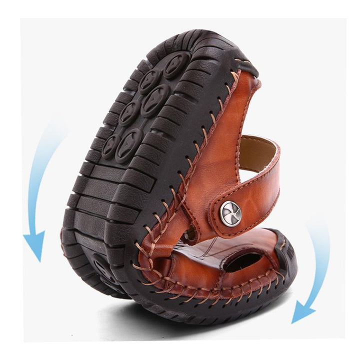 Detail of the hand-stitched craftsmanship on men's leather summer sandals.