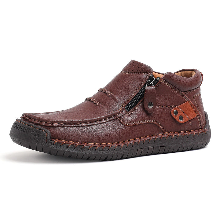 Men's hand-stitched high-top leather boots, emphasizing the excellent craftsmanship and footwear design.