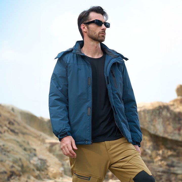 Men's insulated technical jacket with adjustable hood, water-resistant for alpine conditions.