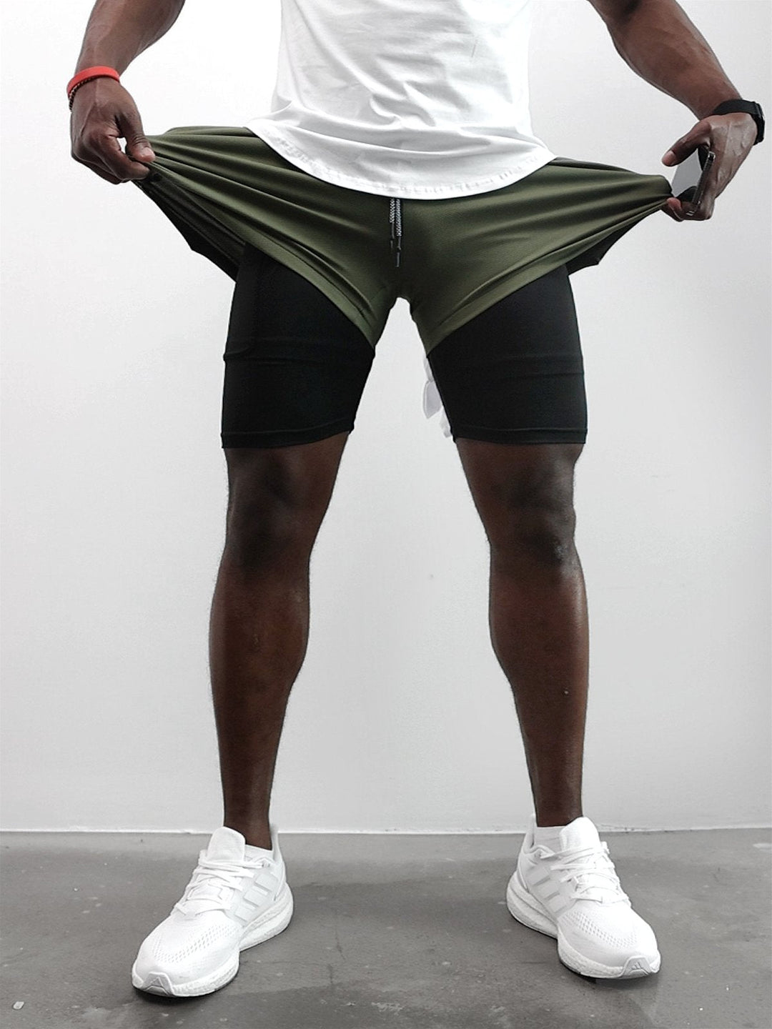 Side view of Men's Kinetic Mesh Lined Shorts, showing athletic fit and movement