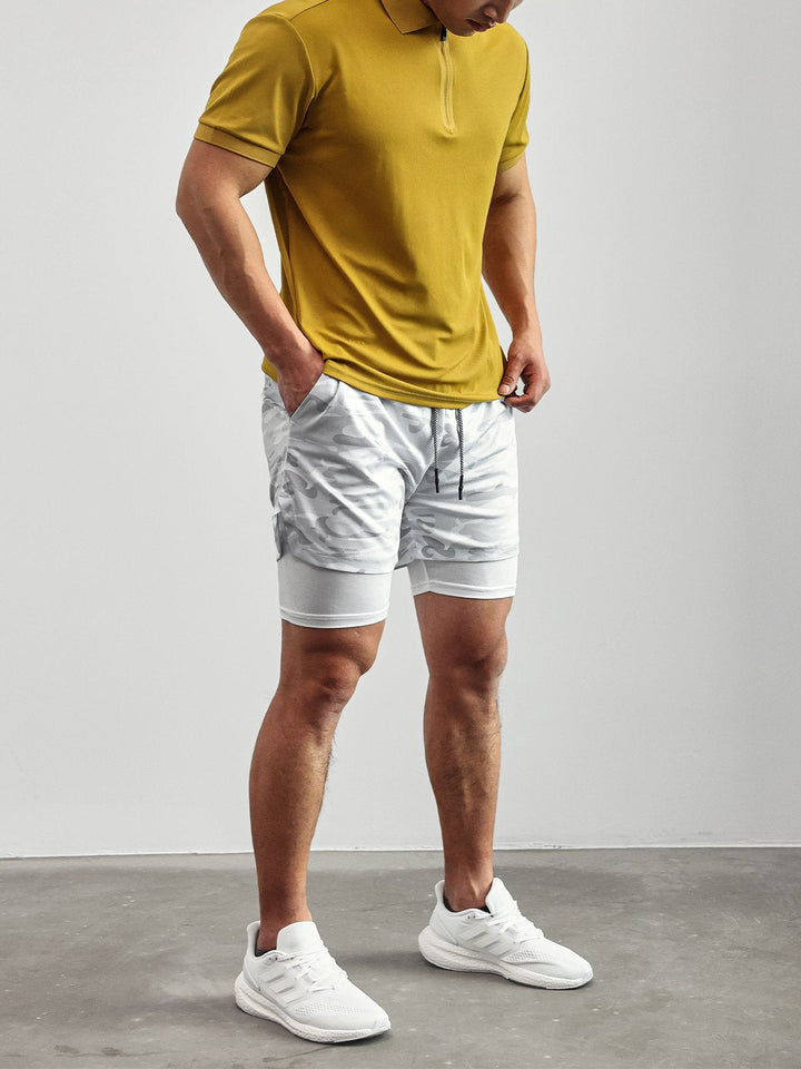 Folded pair of Men's Kinetic Mesh Lined Gym Shorts, ready for your workout
