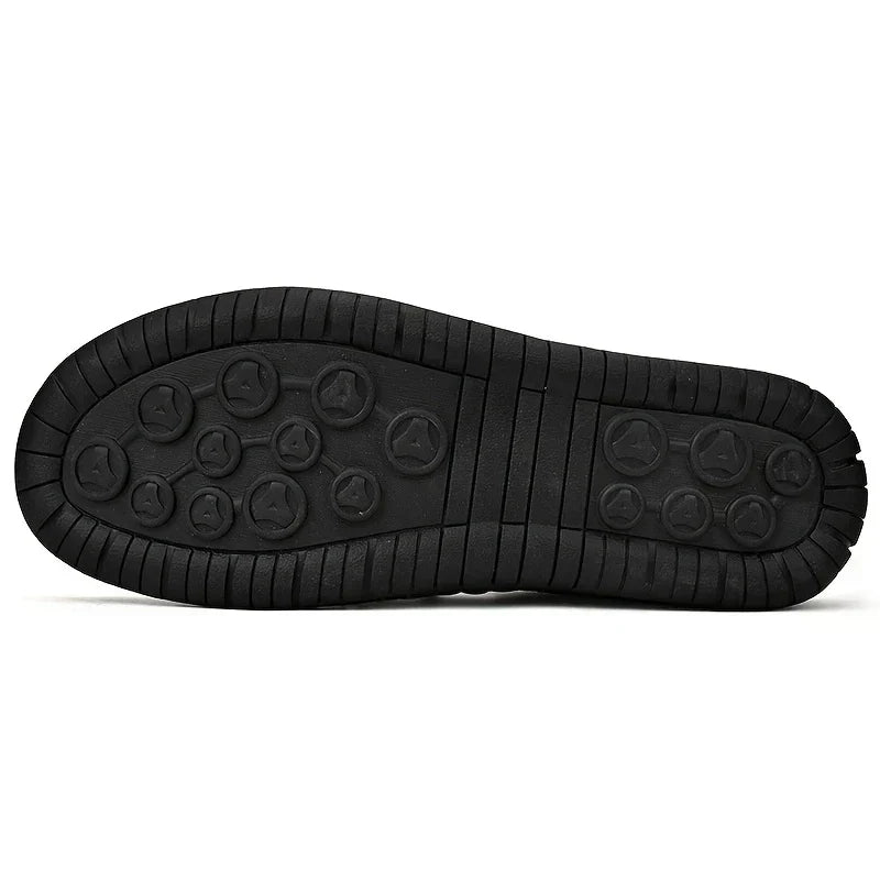 View of mens black leather orthopedic sneakers, slip-on design, providing ultimate comfort and support.