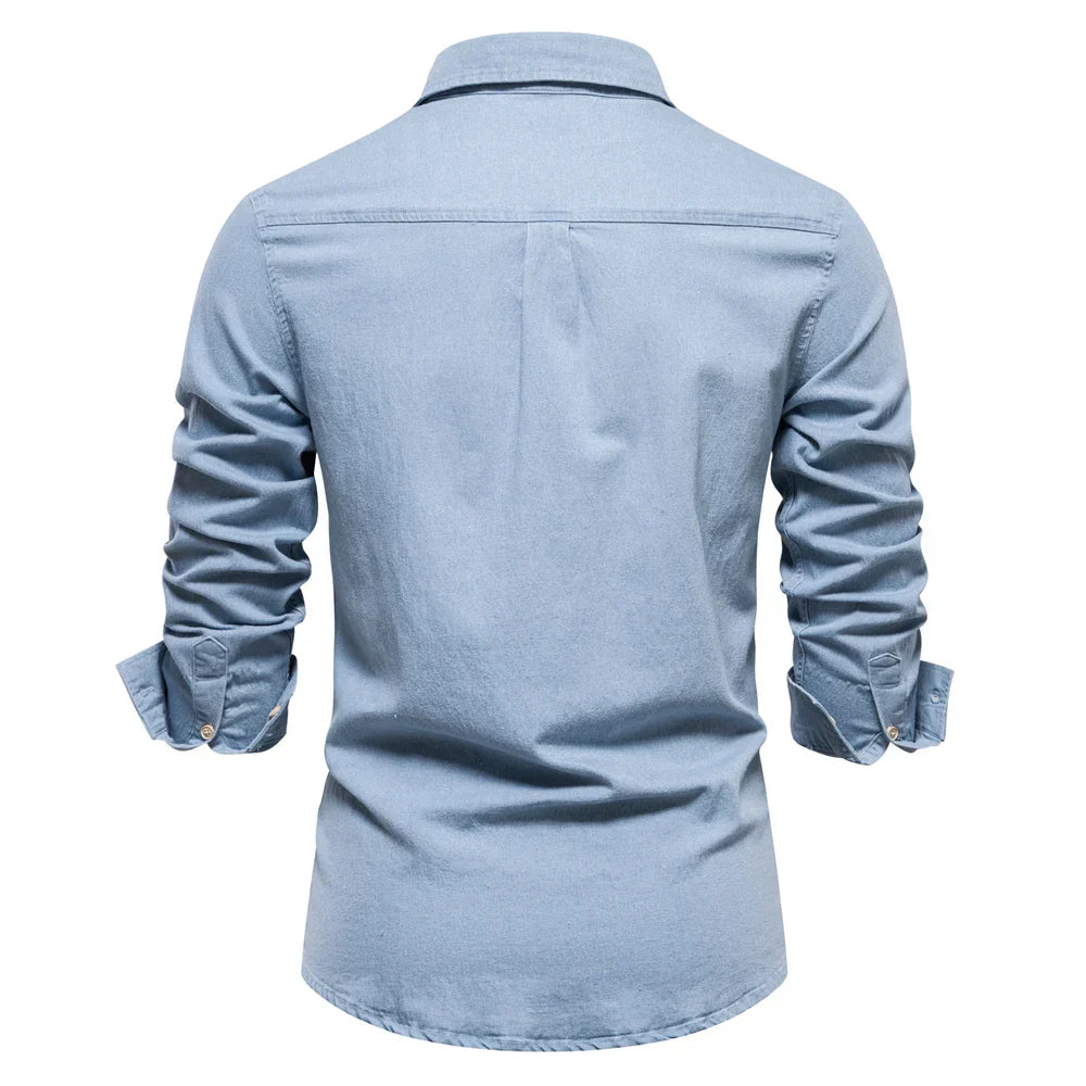 Casual men's light blue denim shirt with buttons, versatile style.