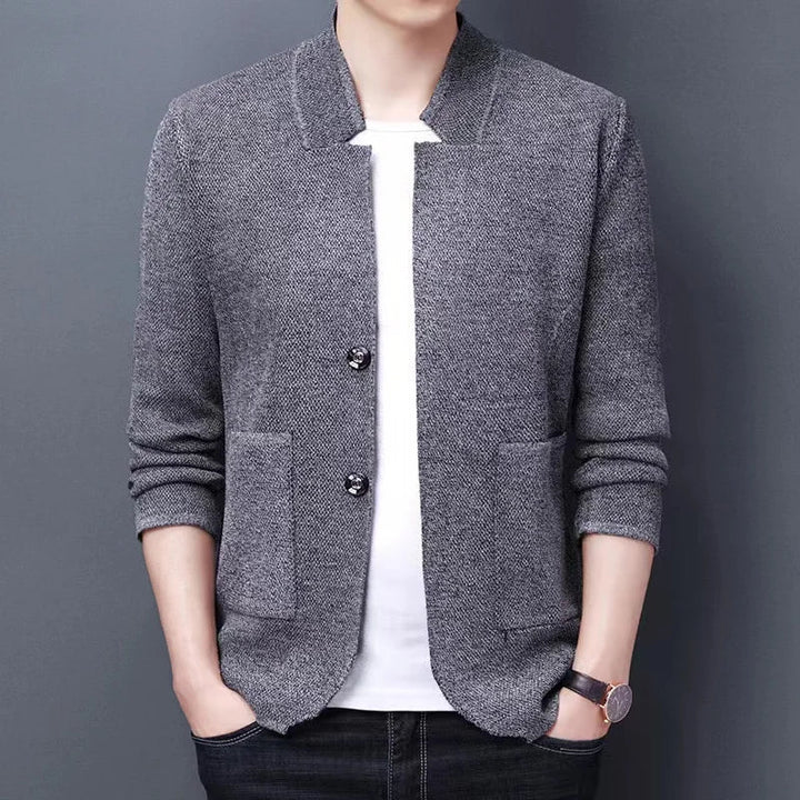 Breathable men's knit blazer, perfect for a smart casual look, shown in a dark grey color.