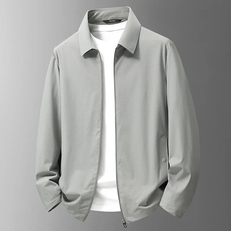 Men's lightweight waterproof performance jacket in black, ideal for outdoor adventures and wet weather.