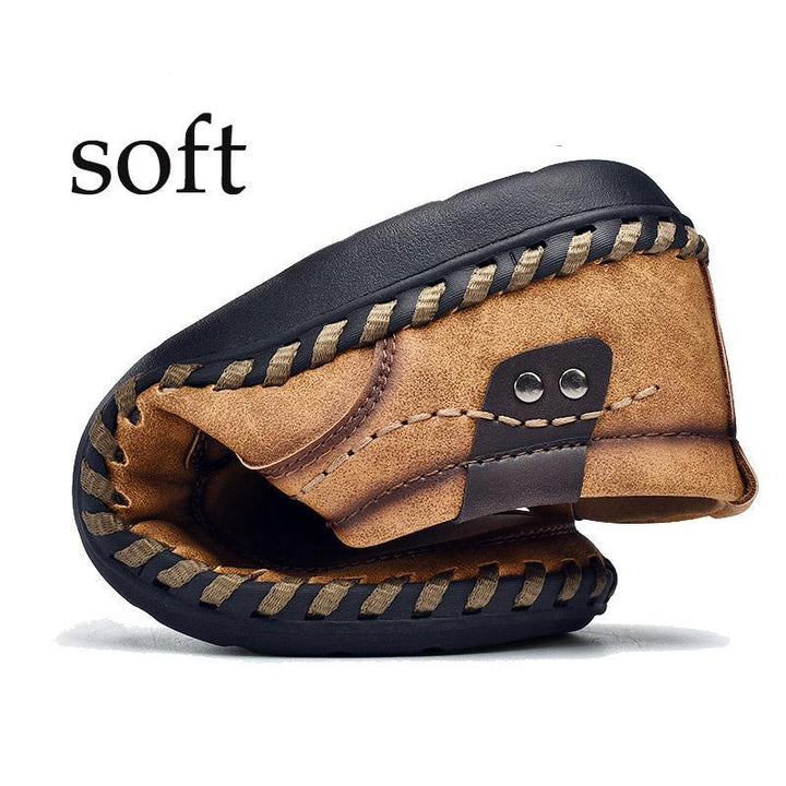 Front view of men's black leather business casual footwear, sleek design, round toe