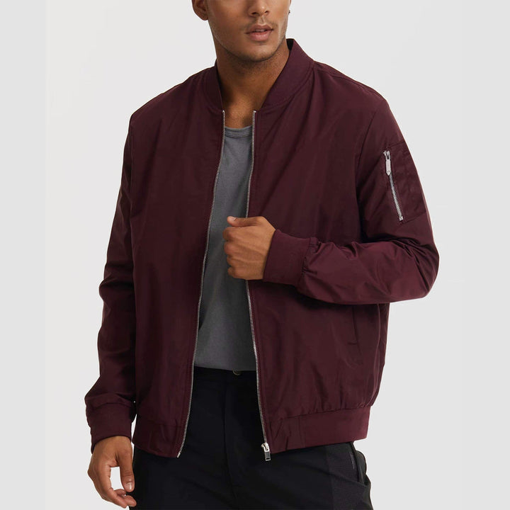 Three-quarter view of men's bomber jacket, showcasing the modern cut and athletic fit