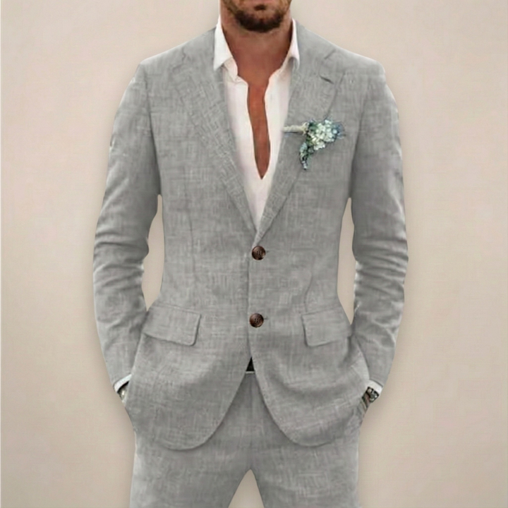 Close-up of the notch lapel and fabric detail on a men's modern two-piece formal suit.